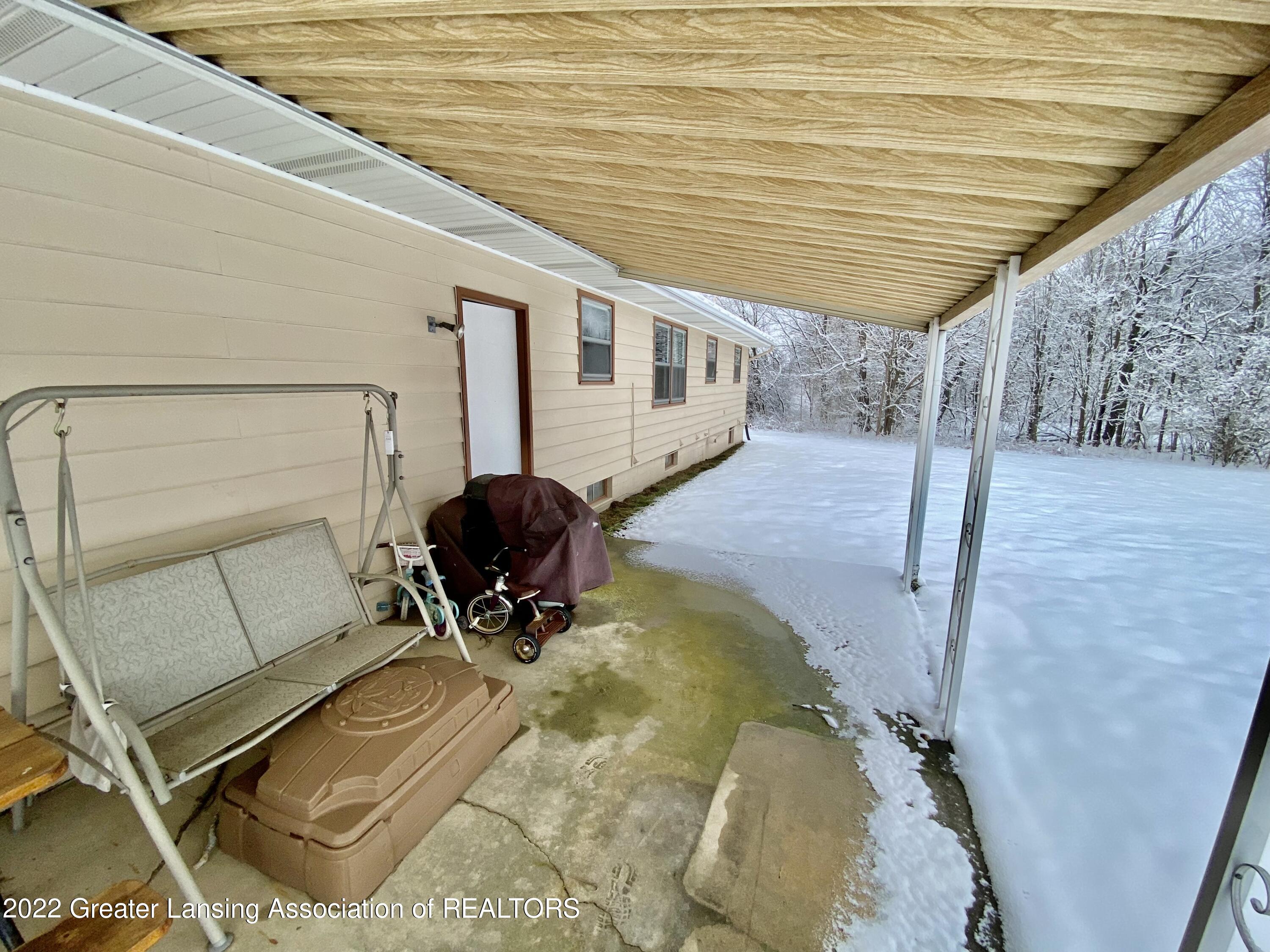 4770 North Gunnell Road Dimondale, MI 48821 - Photo 5 of 32 back covered porch