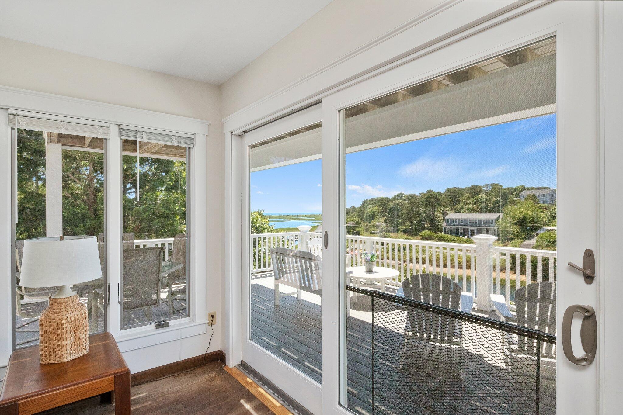 4 Portview Road Chatham, MA 02659 - Photo 14 of 69 a view of a room with wooden floor and windows