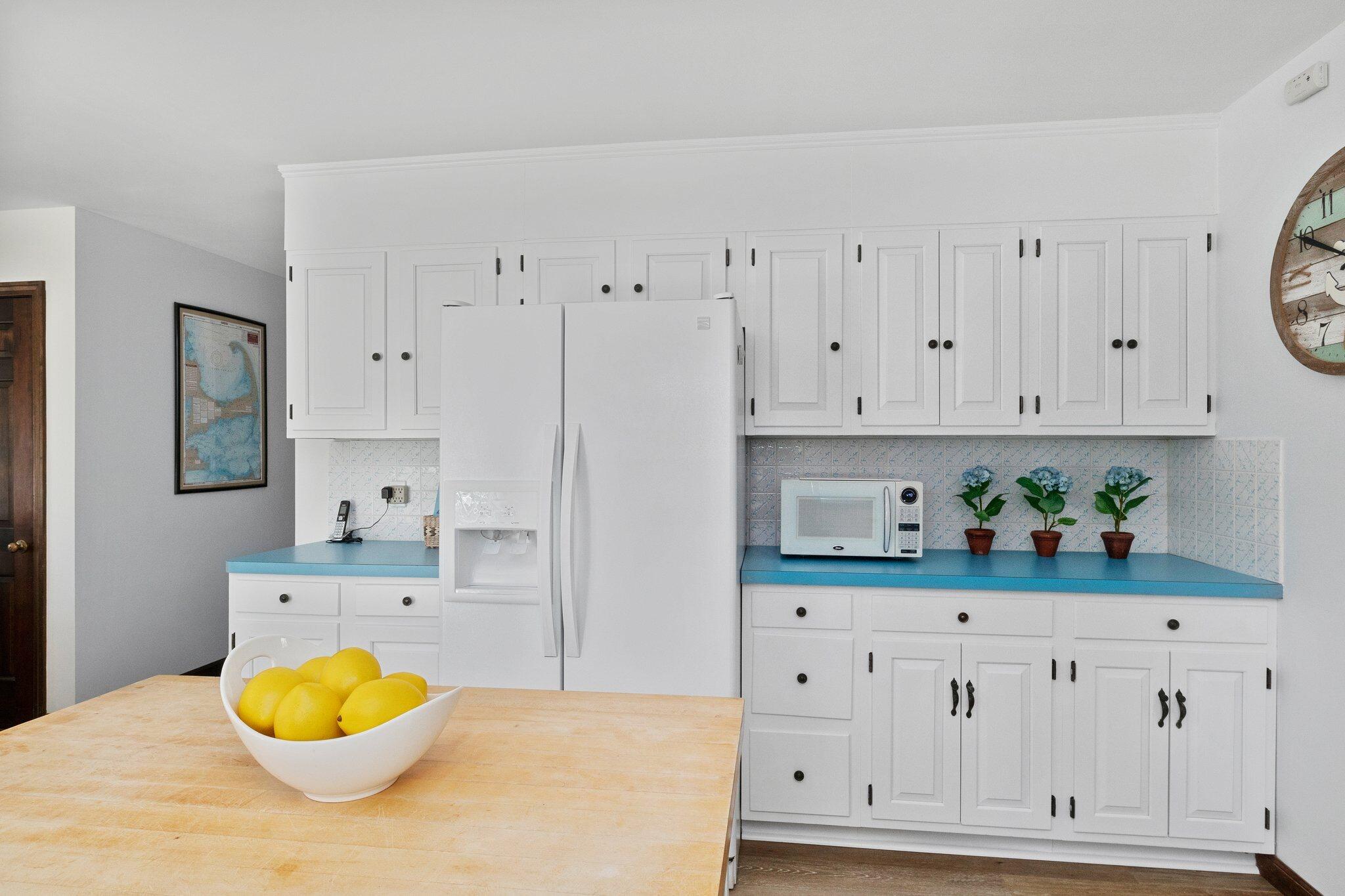 4 Portview Road Chatham, MA 02659 - Photo 27 of 69 a bedroom with white cabinets and wooden floor