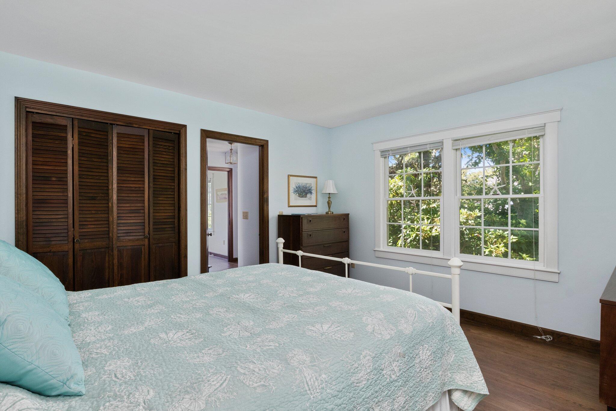 4 Portview Road Chatham, MA 02659 - Photo 28 of 69 a bedroom with a bed and a large window