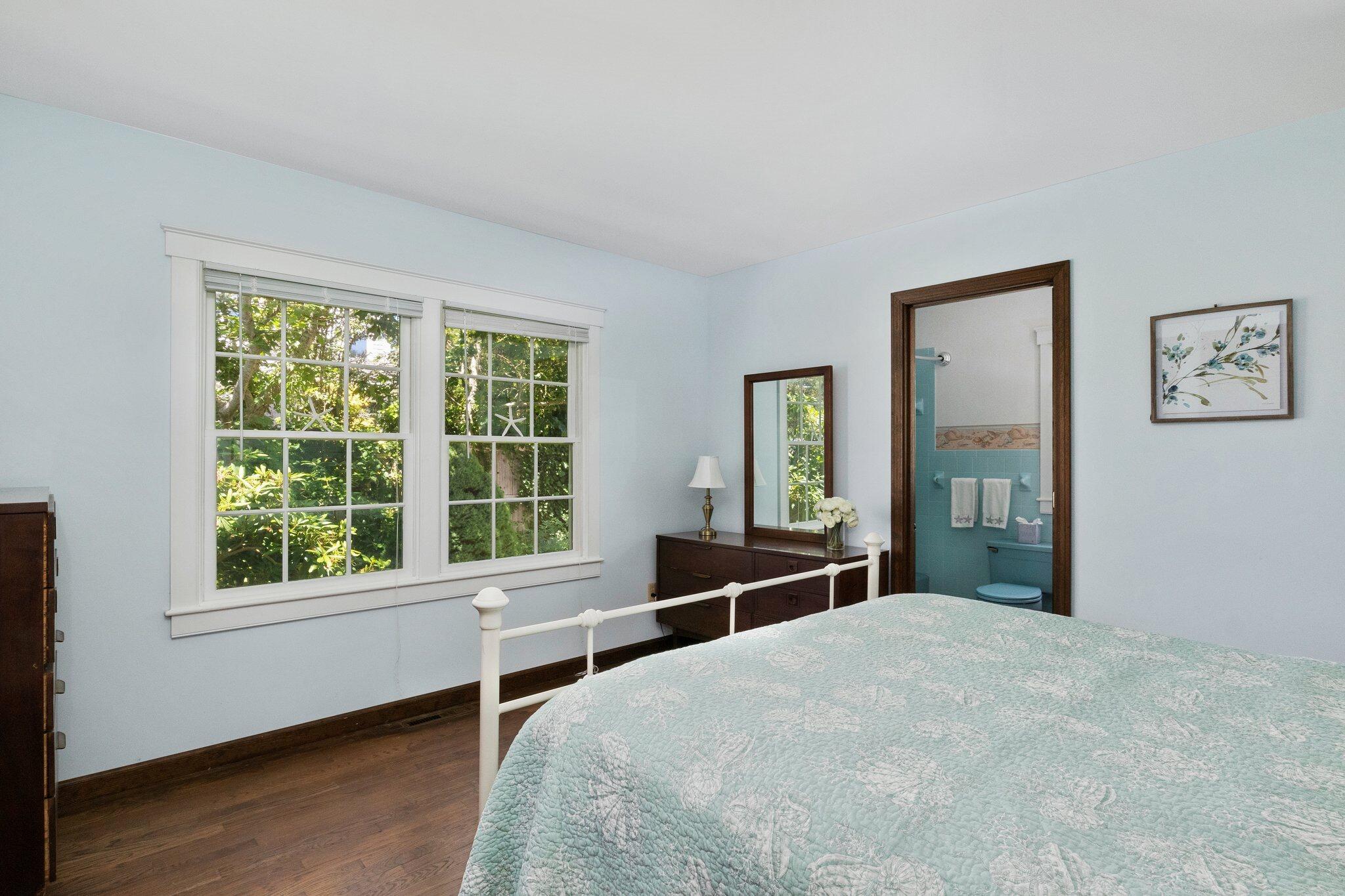 4 Portview Road Chatham, MA 02659 - Photo 32 of 69 a bedroom with a large bed and a window