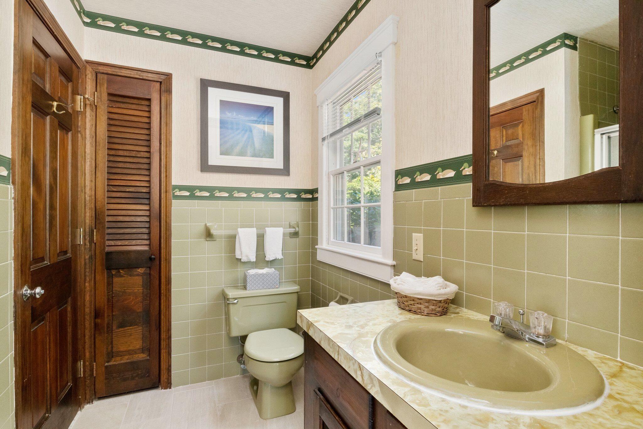 4 Portview Road Chatham, MA 02659 - Photo 33 of 69 a bathroom with a sink a toilet and shower