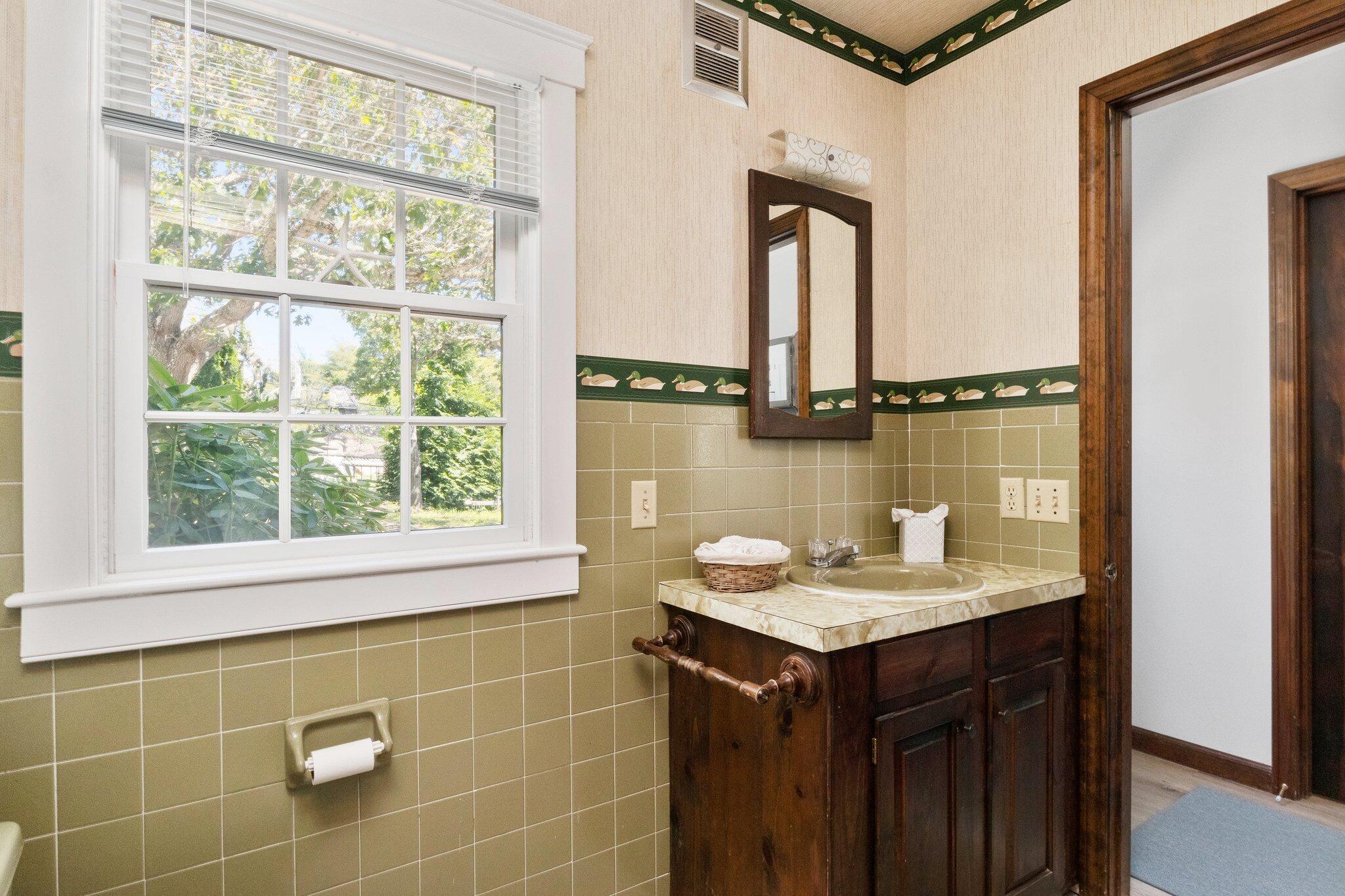 4 Portview Road Chatham, MA 02659 - Photo 34 of 69 a bathroom with a sink vanity and a mirror