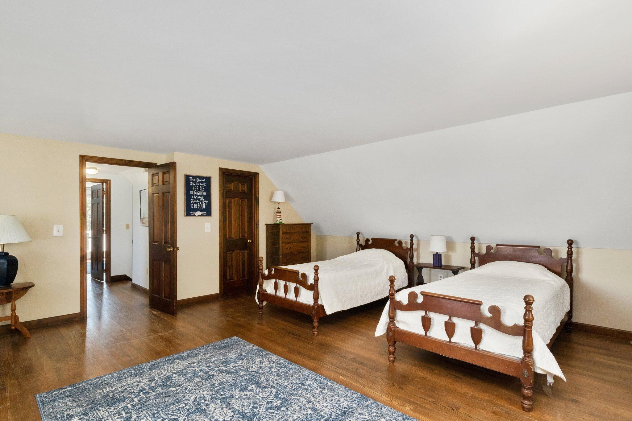 4 Portview Road Chatham, MA 02659 - Photo 39 of 69 a bedroom with two beds and wooden floor