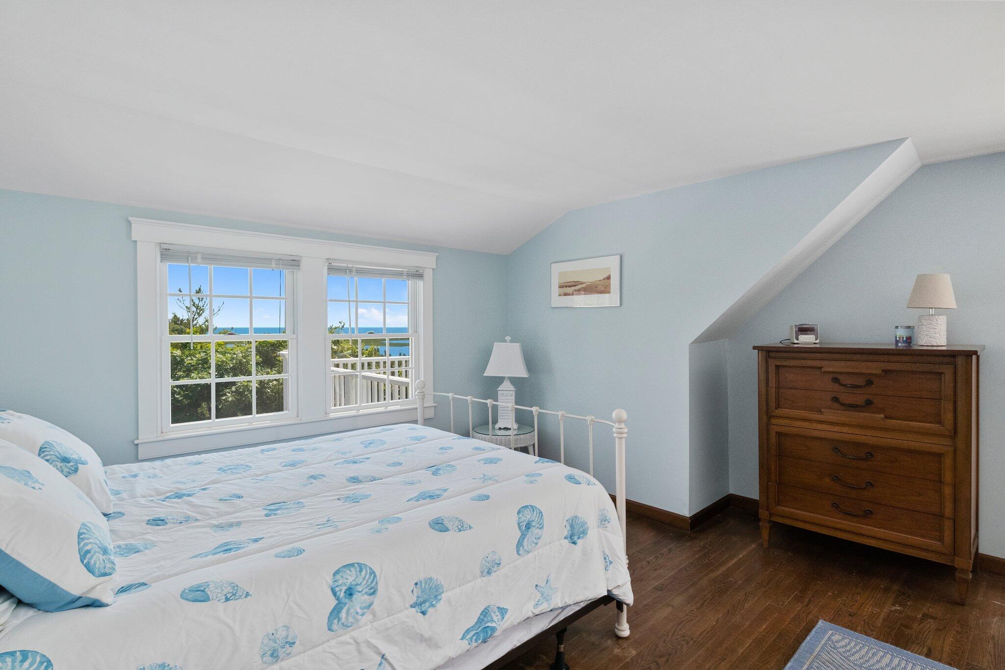 4 Portview Road Chatham, MA 02659 - Photo 44 of 69 a bedroom with a bed and a dresser