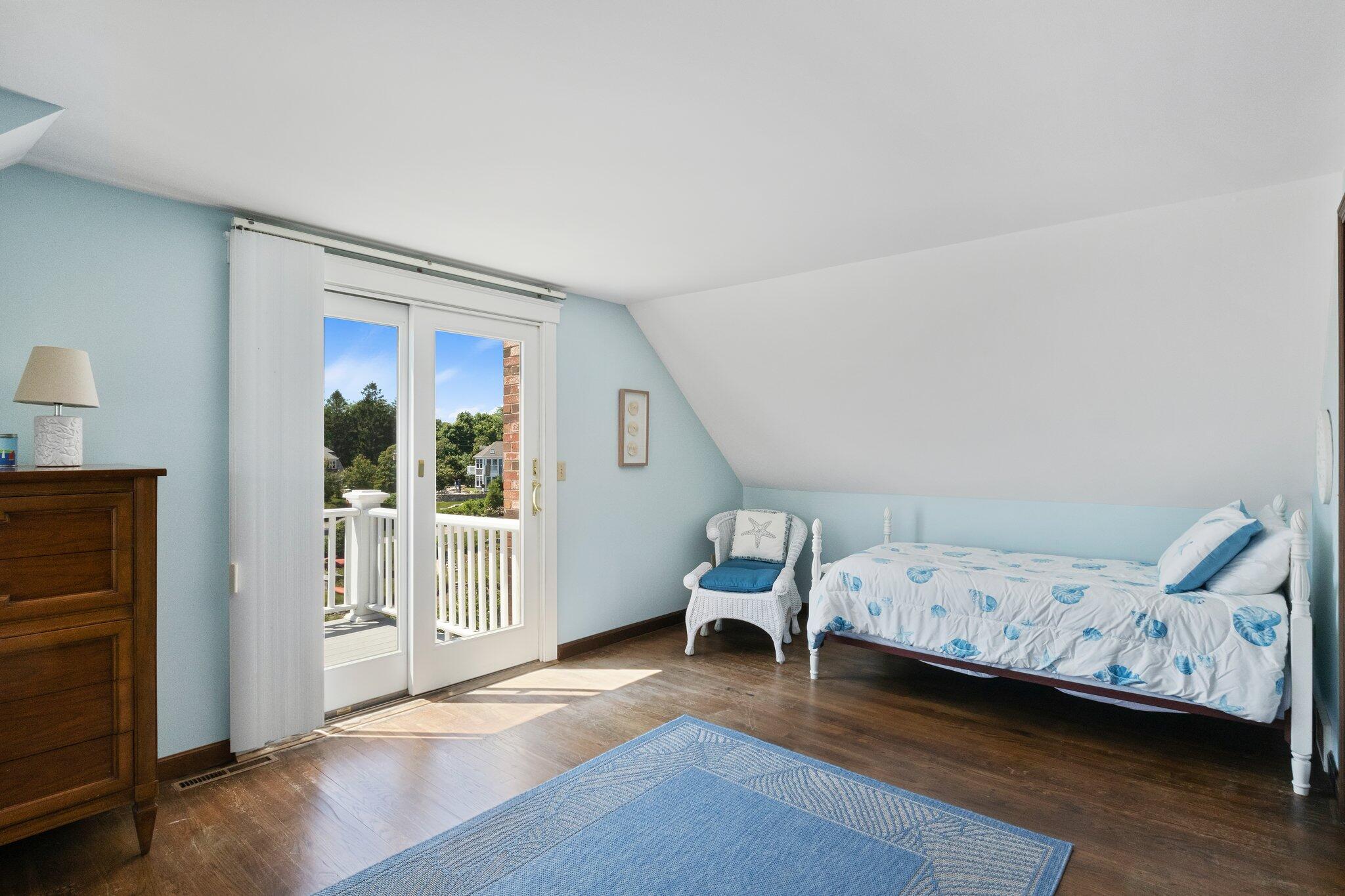 4 Portview Road Chatham, MA 02659 - Photo 46 of 69 a bedroom with a bed and wooden floor