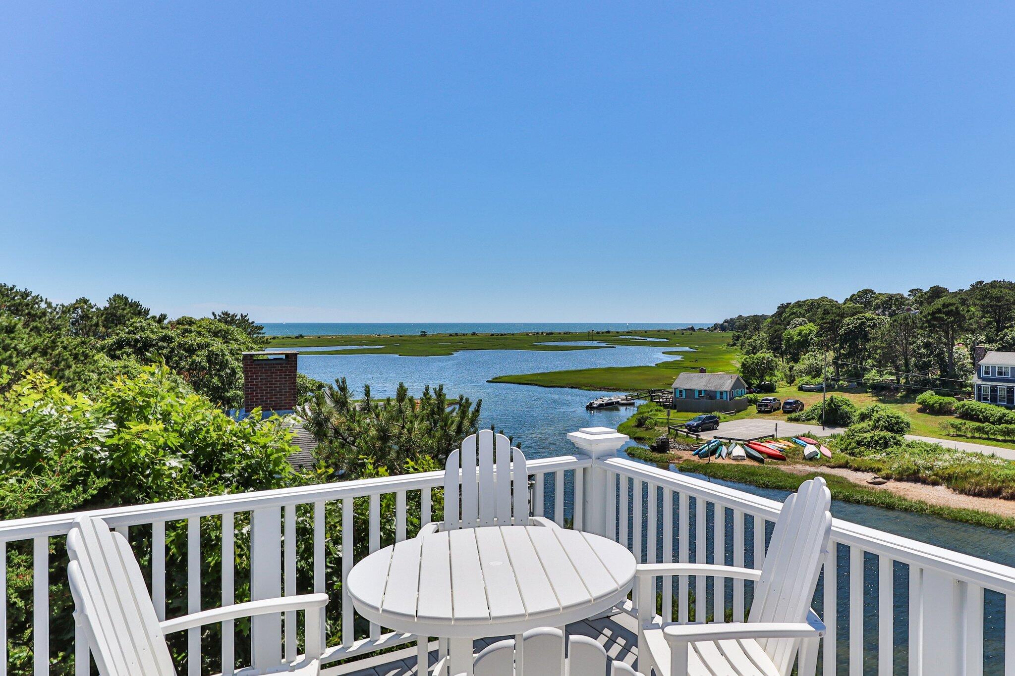 4 Portview Road Chatham, MA 02659 - Photo 48 of 69 a view of a balcony with wooden floor and fence