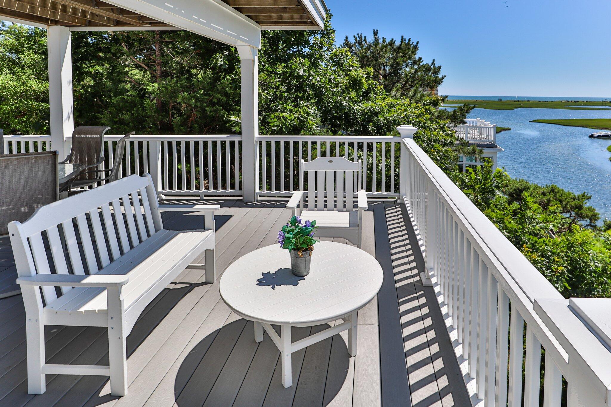 4 Portview Road Chatham, MA 02659 - Photo 52 of 69 a balcony with wooden floor and outdoor seating
