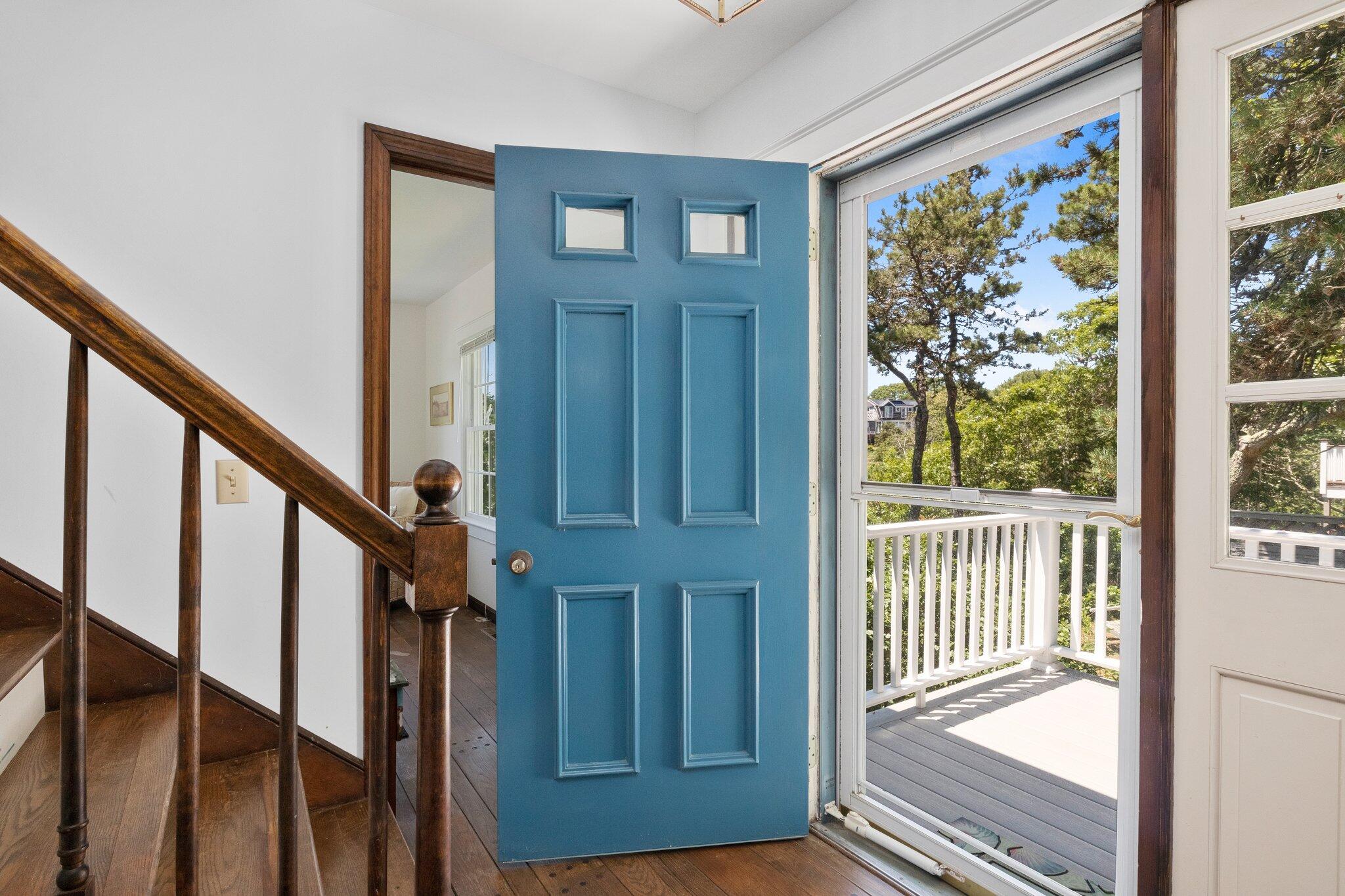 4 Portview Road Chatham, MA 02659 - Photo 8 of 69 a view of a porch with wooden floor and stairs