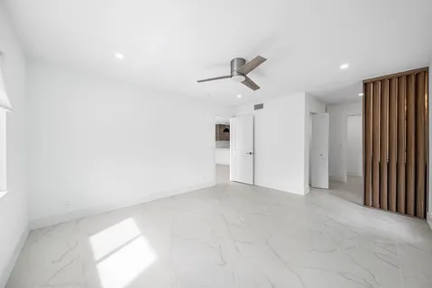 a bathroom with a double vanity sink mirror and double