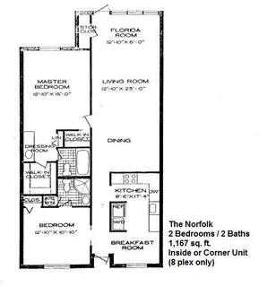 a kitchen with a refrigerator and a stove top oven
