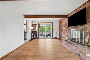 283 Brookwood Road Venetia, PA 15367 - Photo 11 of 36 a view of a livingroom with an empty space and a fireplace
