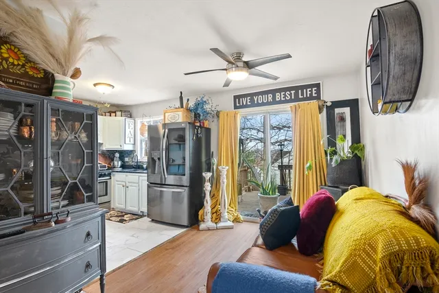 a bed room with a bed and a chandelier