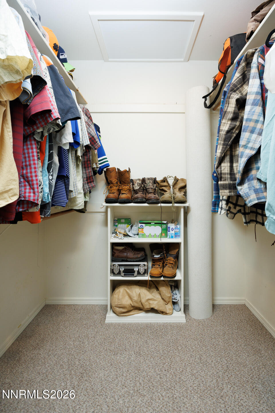 4033 Cimarron Road Fallon, NV 89406 - Photo 18 of 31 a view of walk in closet with clothes and shoes