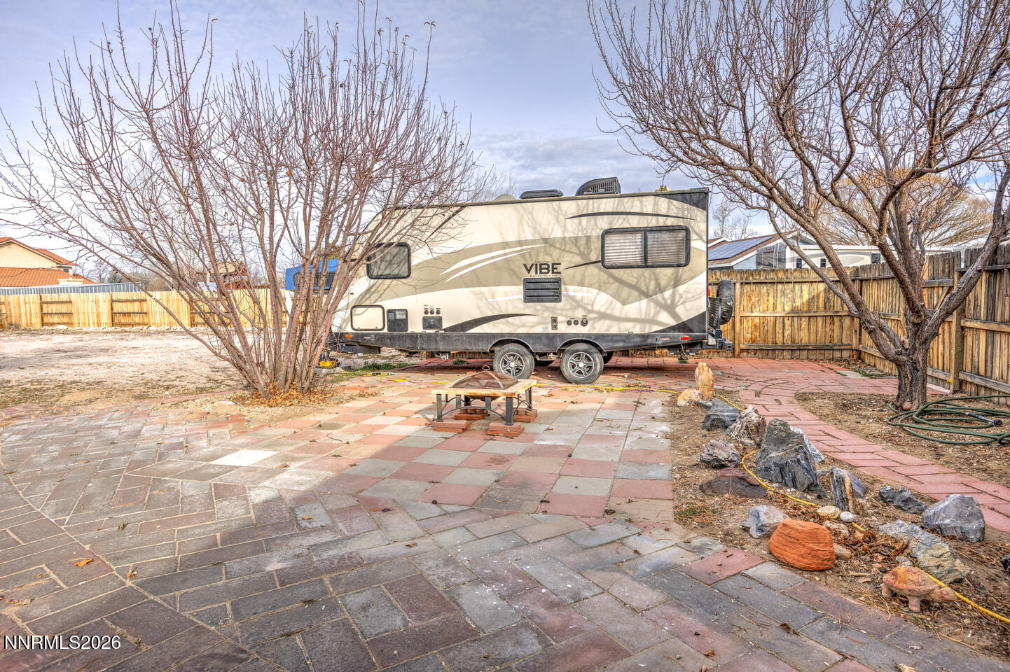4033 Cimarron Road Fallon, NV 89406 - Photo 23 of 31 a view of a yard with snow on the road