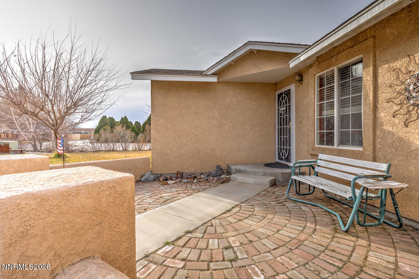 4033 Cimarron Road Fallon, NV 89406 - Photo 26 of 31 a backyard of a house with outdoor seating