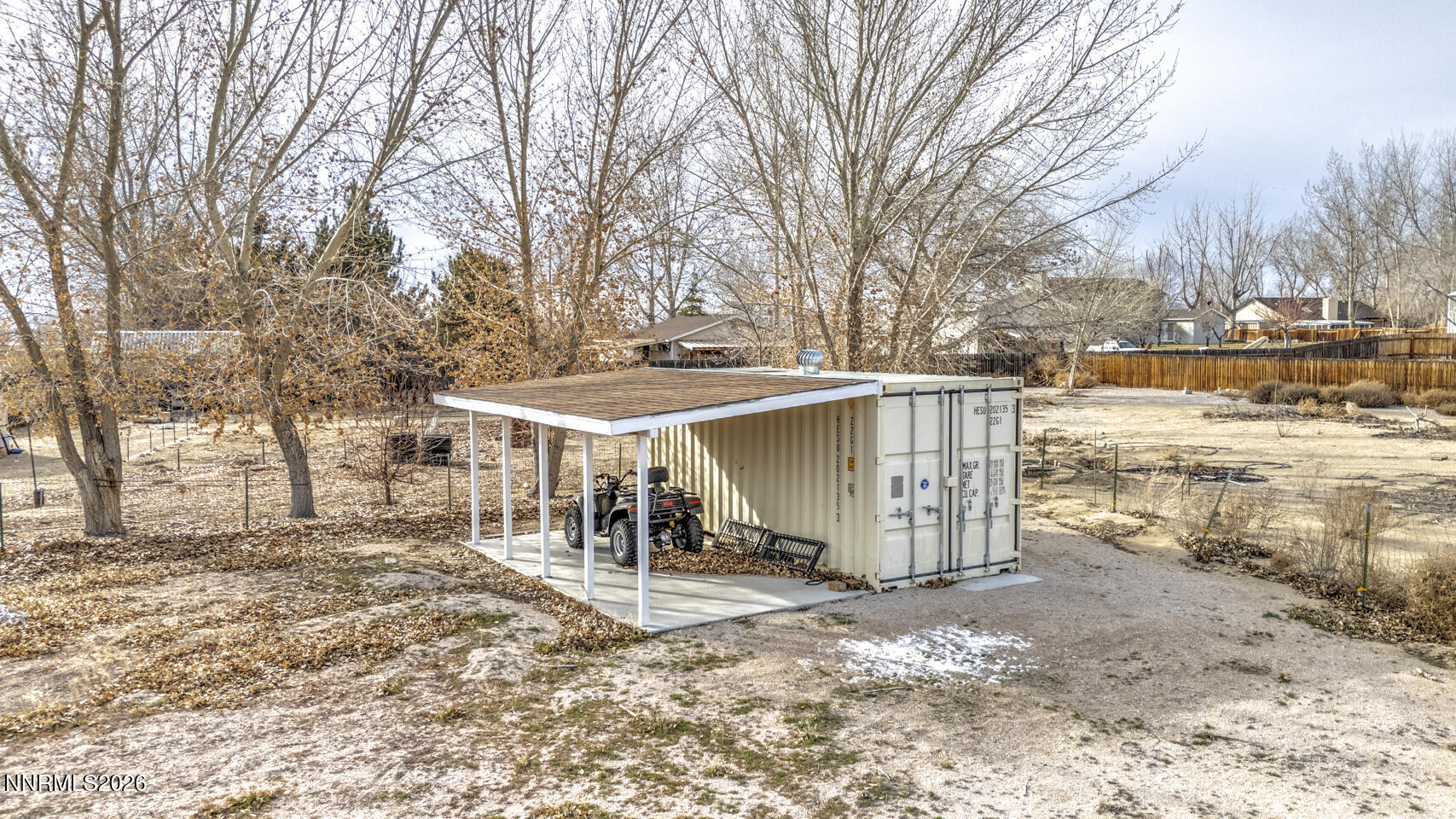 4033 Cimarron Road Fallon, NV 89406 - Photo 27 of 31 a view of a house with a yard covered in snow
