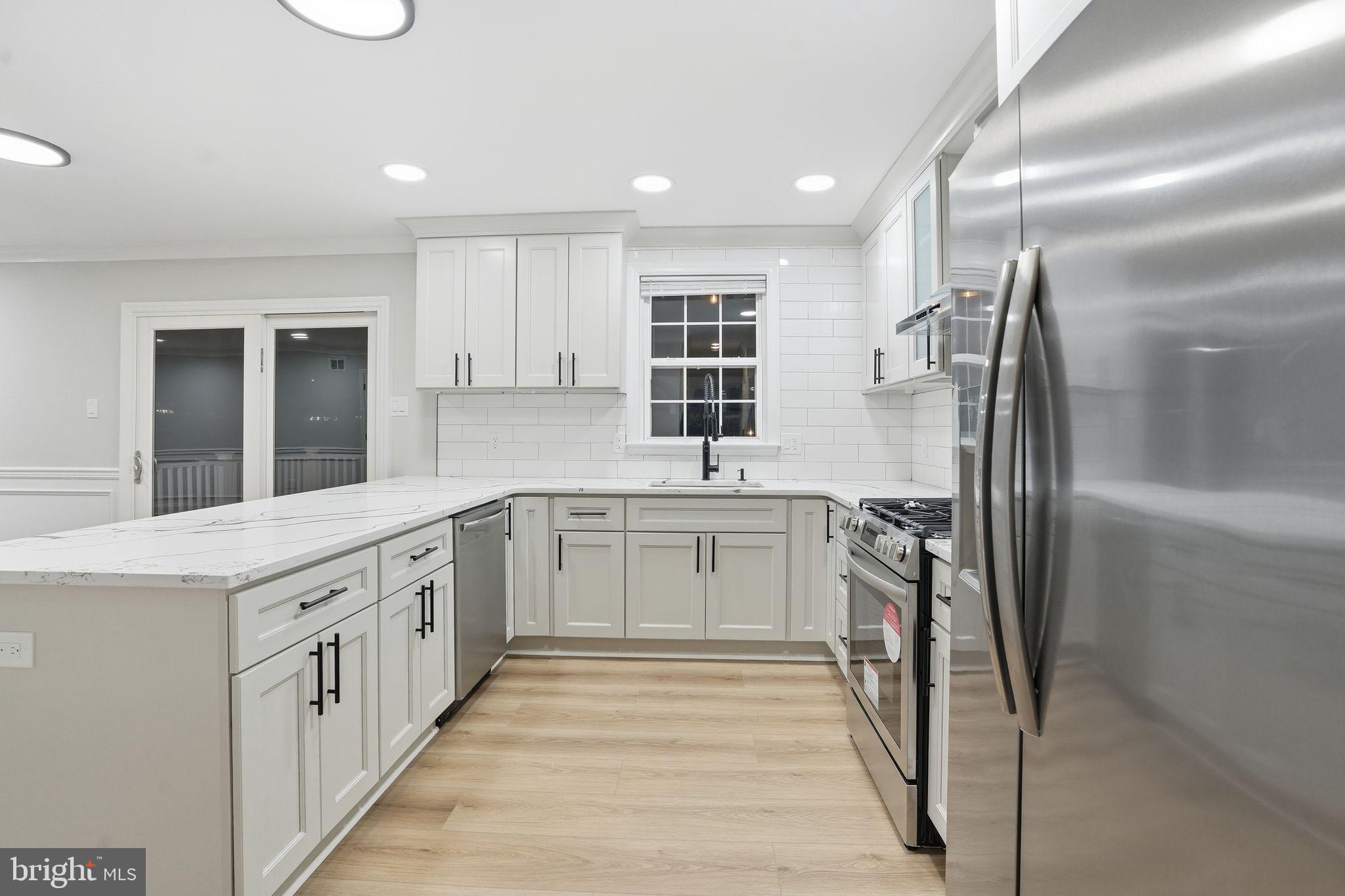 35 Church Road Elkins Park, PA 19027 - Photo 13 of 64 Modern kitchen with sleek finishes.