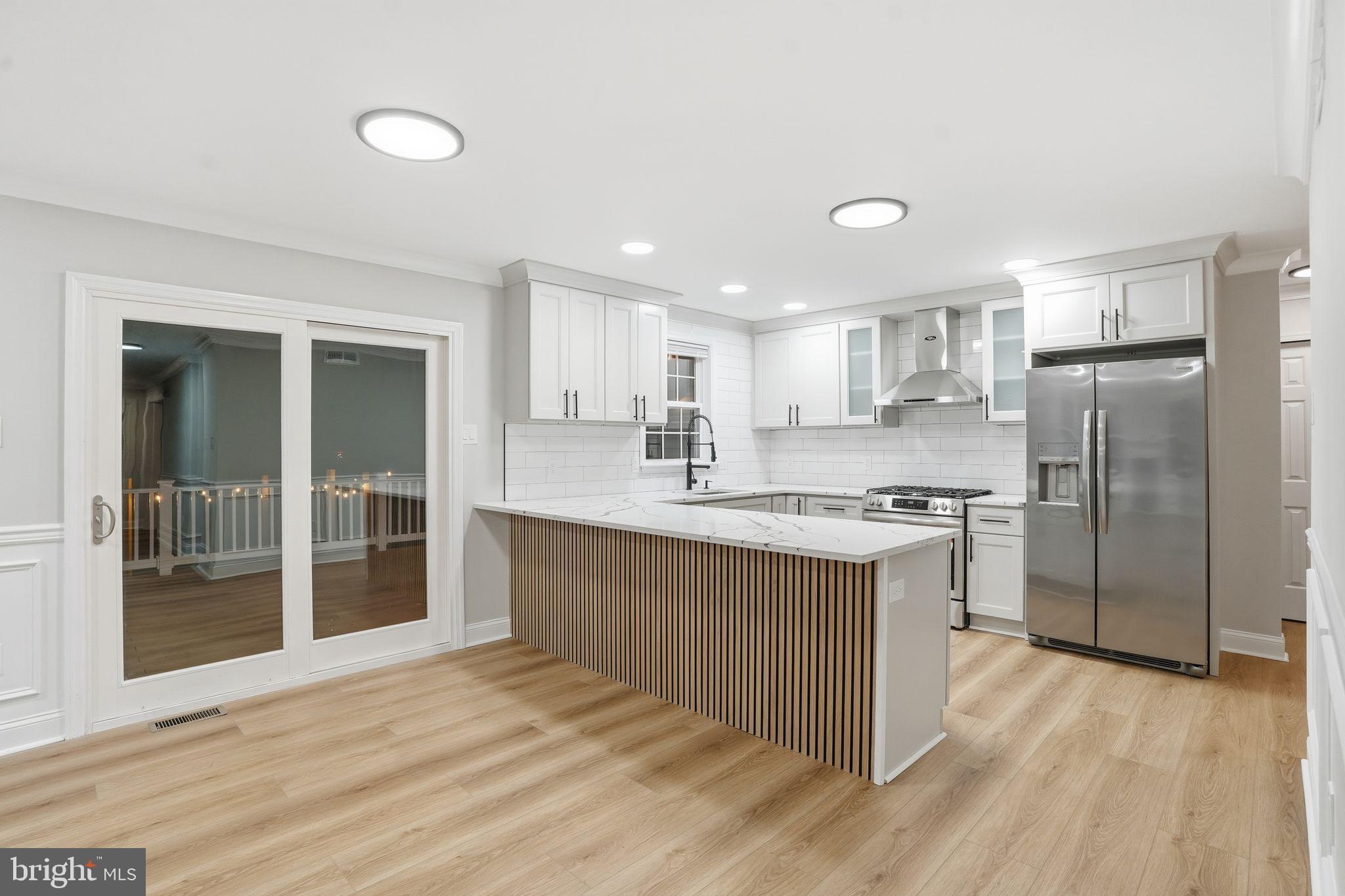35 Church Road Elkins Park, PA 19027 - Photo 16 of 64 Modern kitchen with sleek design elements.