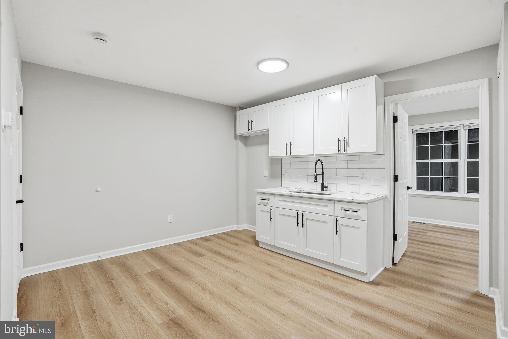 35 Church Road Elkins Park, PA 19027 - Photo 27 of 64 Modern kitchen with sleek finishes.