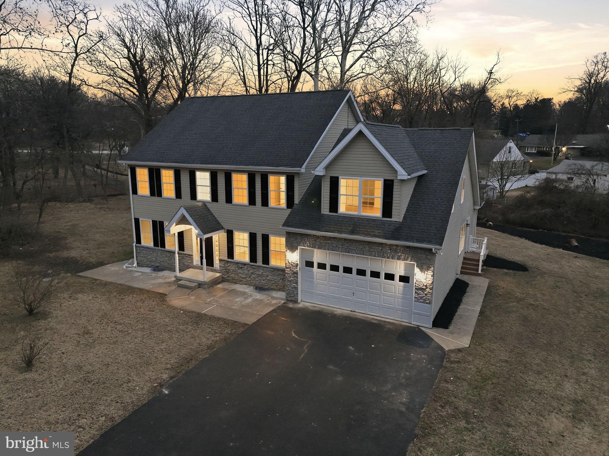 35 Church Road Elkins Park, PA 19027 - Photo 3 of 64 Charming home basking in twilight glow.