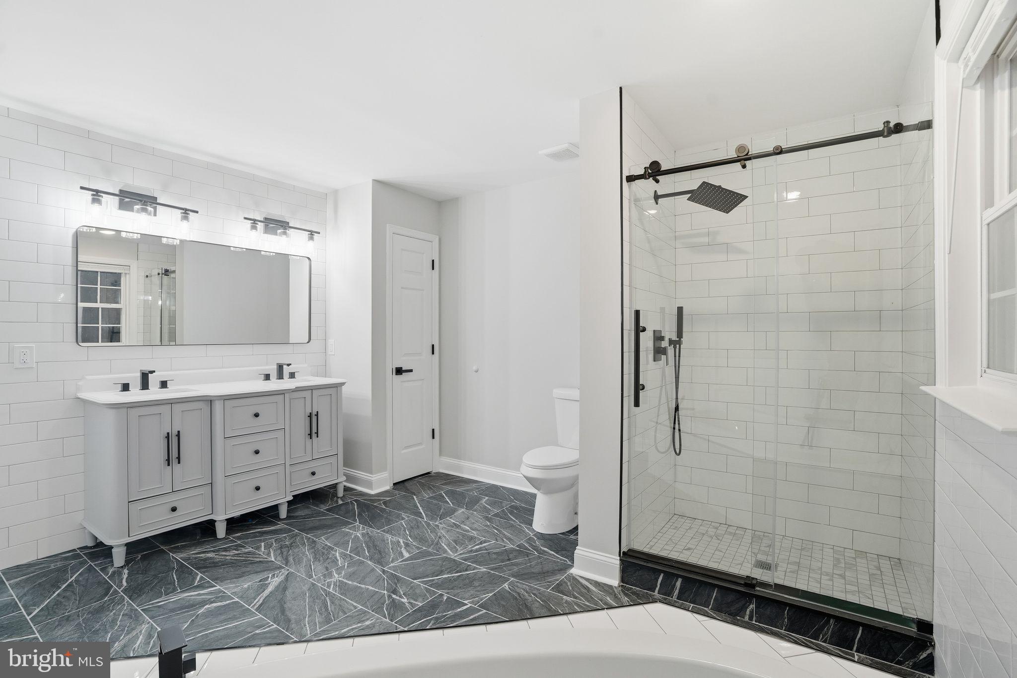 35 Church Road Elkins Park, PA 19027 - Photo 47 of 64 Sleek modern bathroom with elegant finishes.