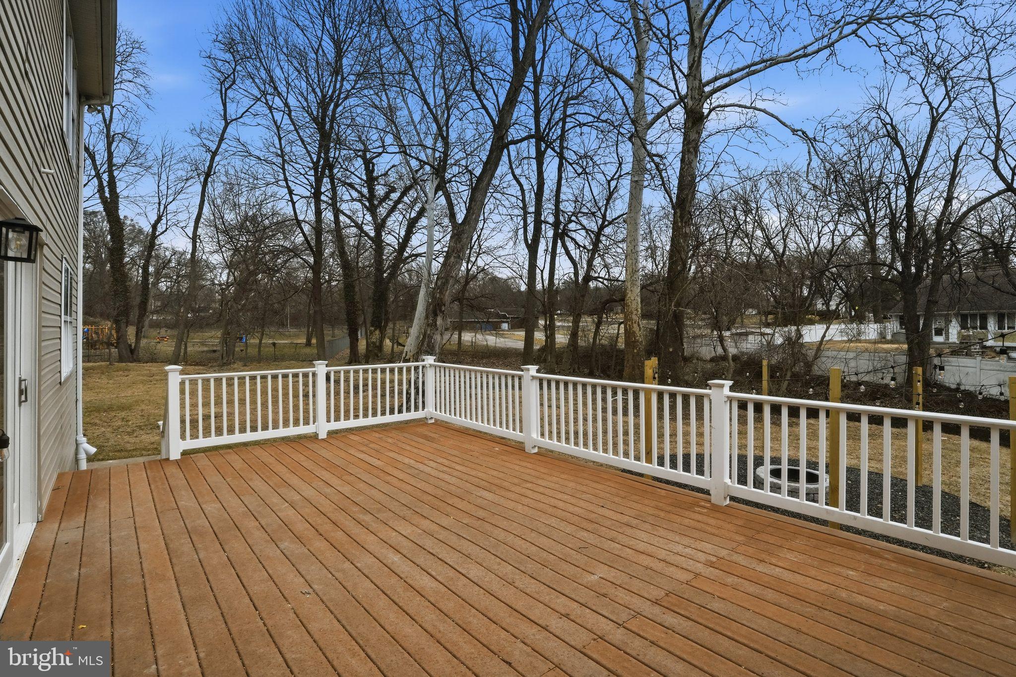 35 Church Road Elkins Park, PA 19027 - Photo 57 of 64 Spacious deck surrounded by serene nature.