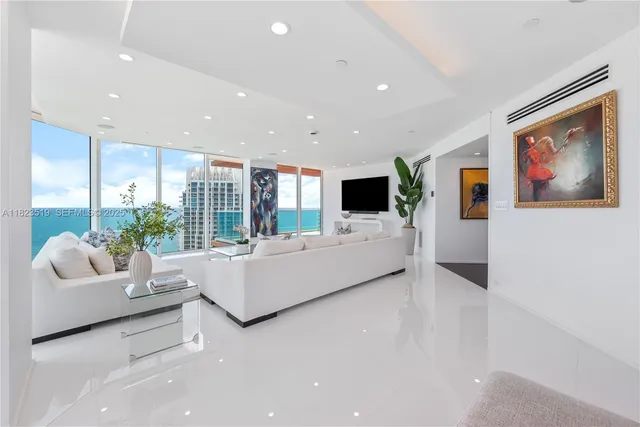 a view of a livingroom with furniture and window