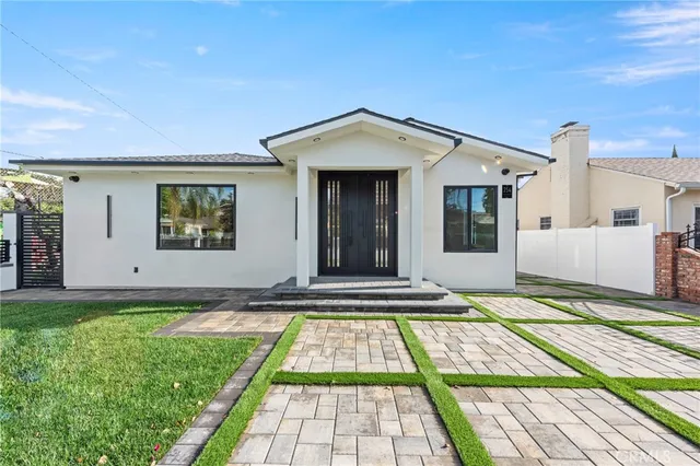 a view of a house with a swimming pool
