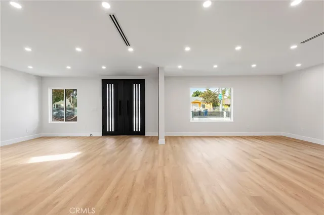 a view of a hallway with a living room
