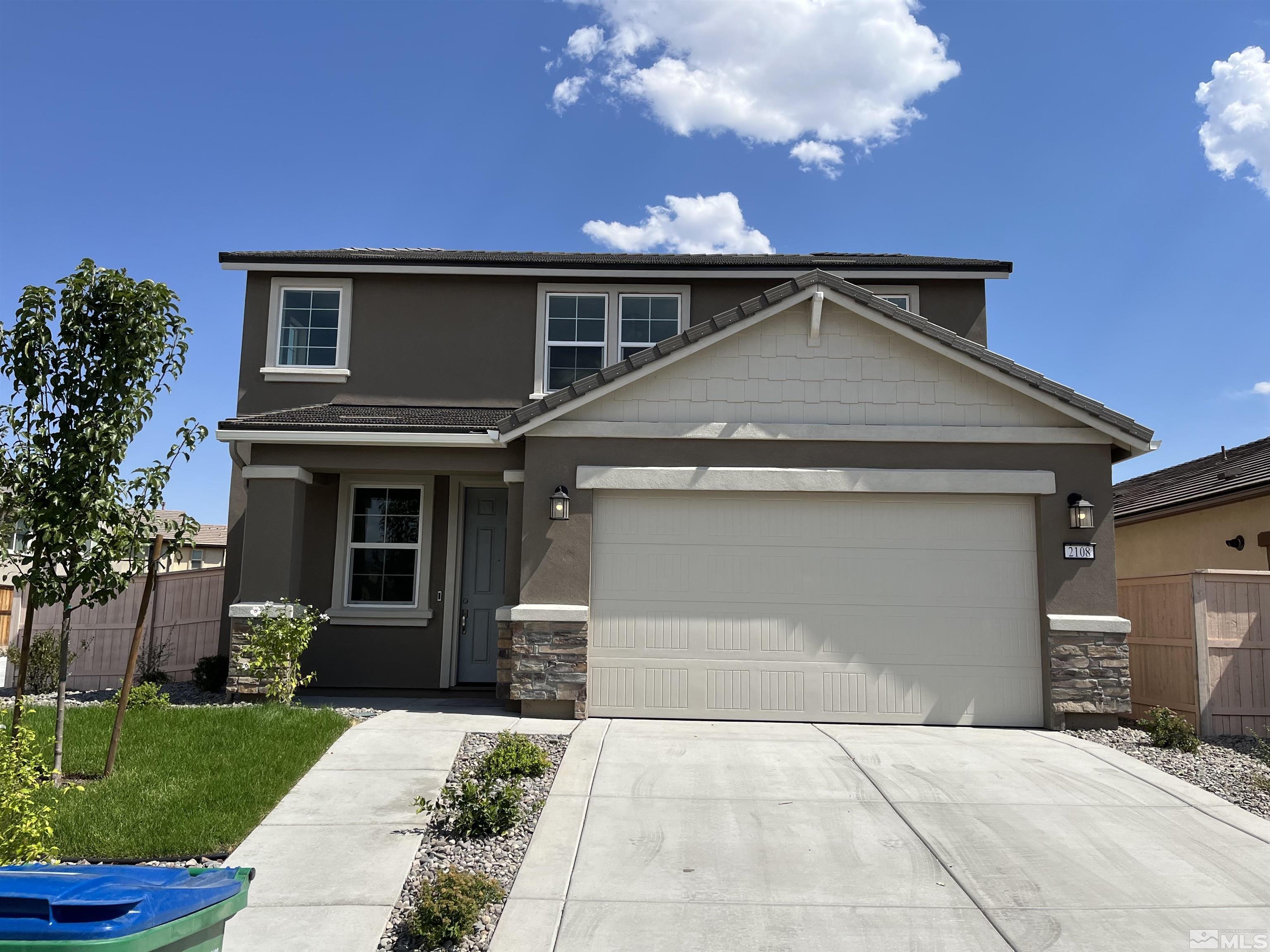 2108 Black Reno, NV 89521 - Photo 1 of 1 a front view of house with yard and green space