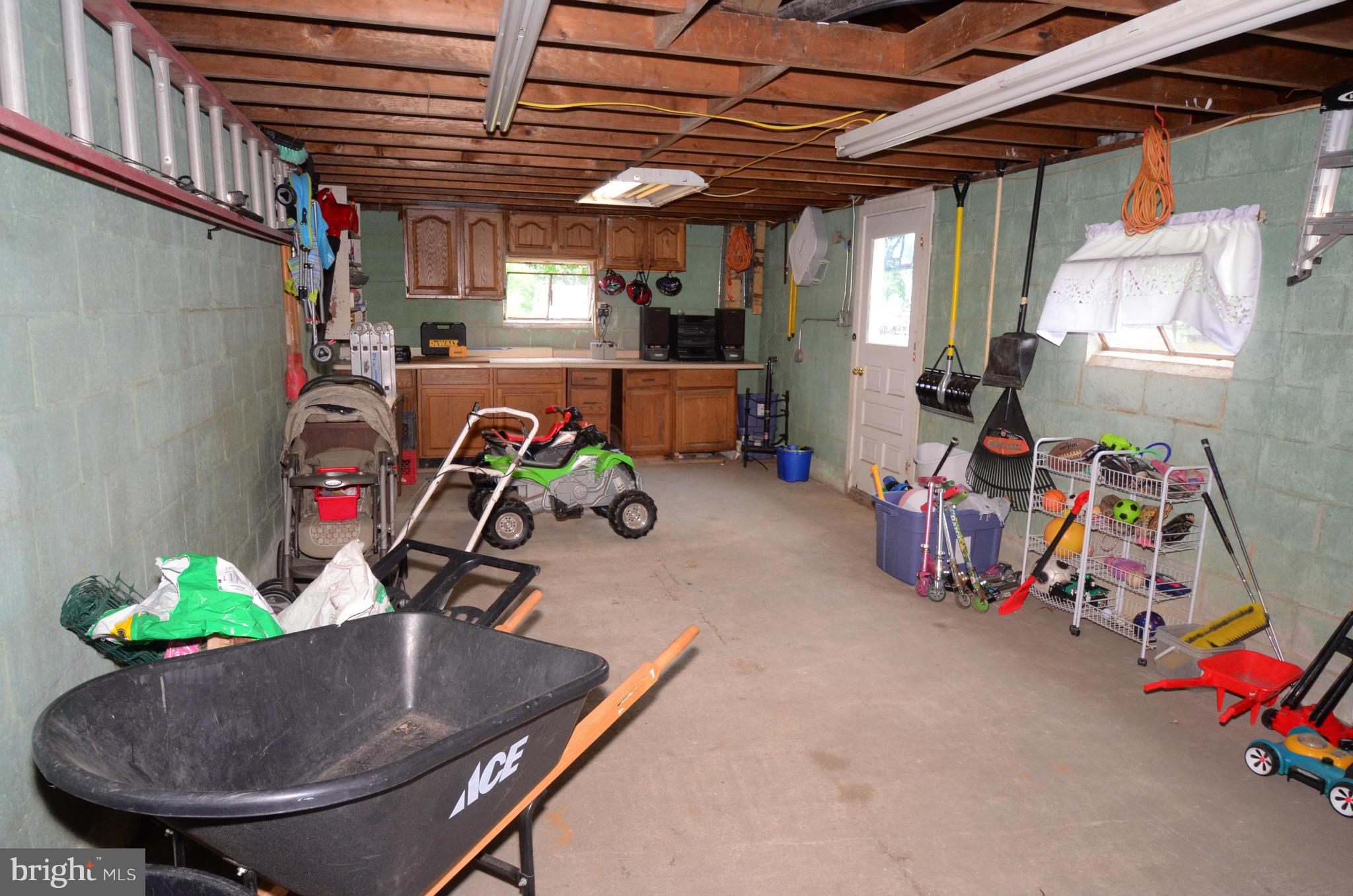 1204 Meadow View Road Pasadena, MD 21122 - Photo 22 of 30 a view of a garage with storage