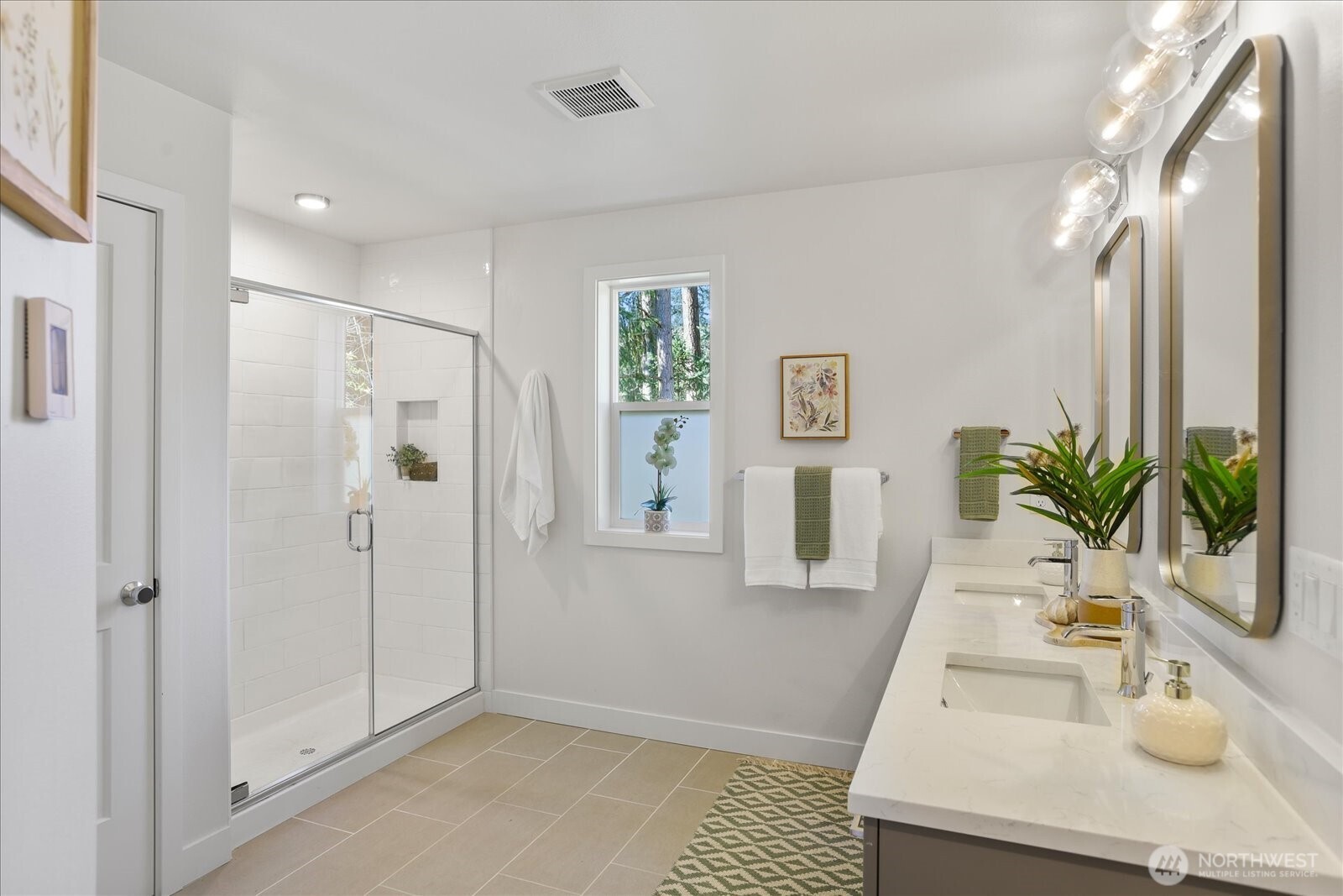 121 171st Place Southwest, Unit B Bothell, WA 98012 - Photo 27 of 36 a view of bathroom with a tub shower vanity and a sink