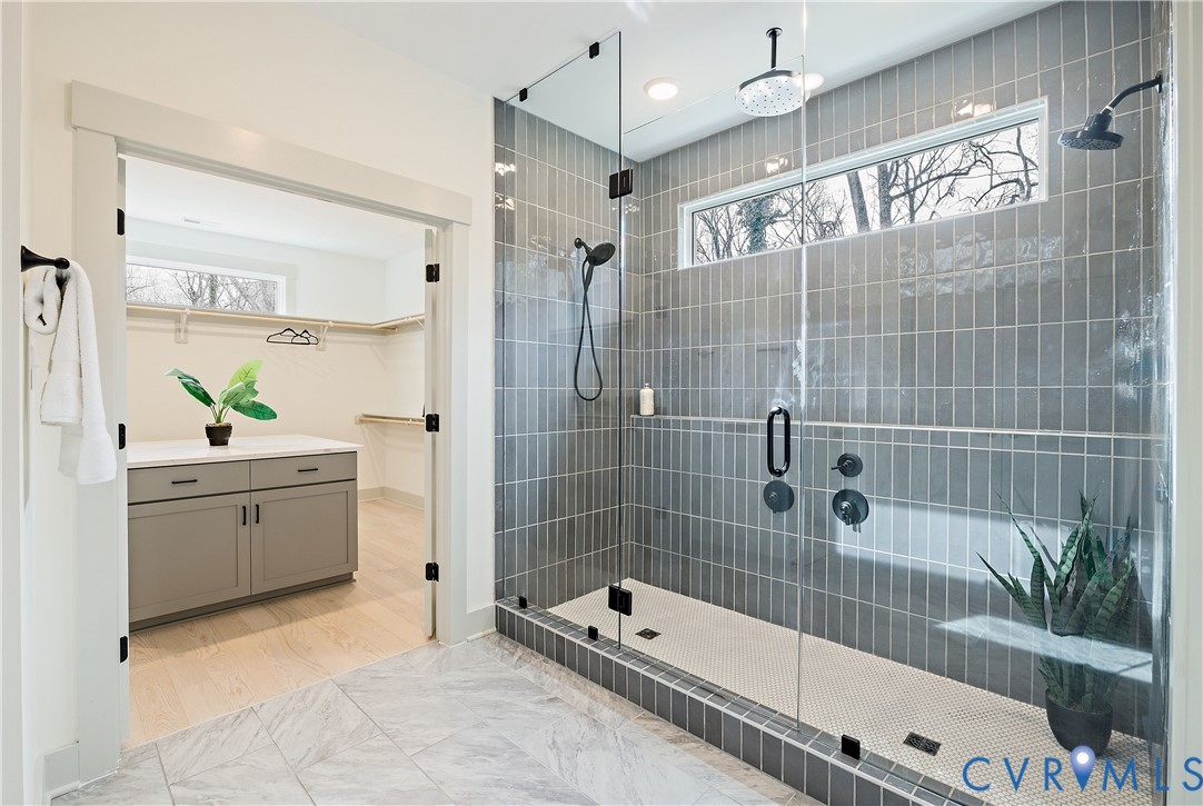 8919 Rustic Road Richmond, VA 23235 - Photo 25 of 36 Walk-in shower featuring full glass enclosure, ver
