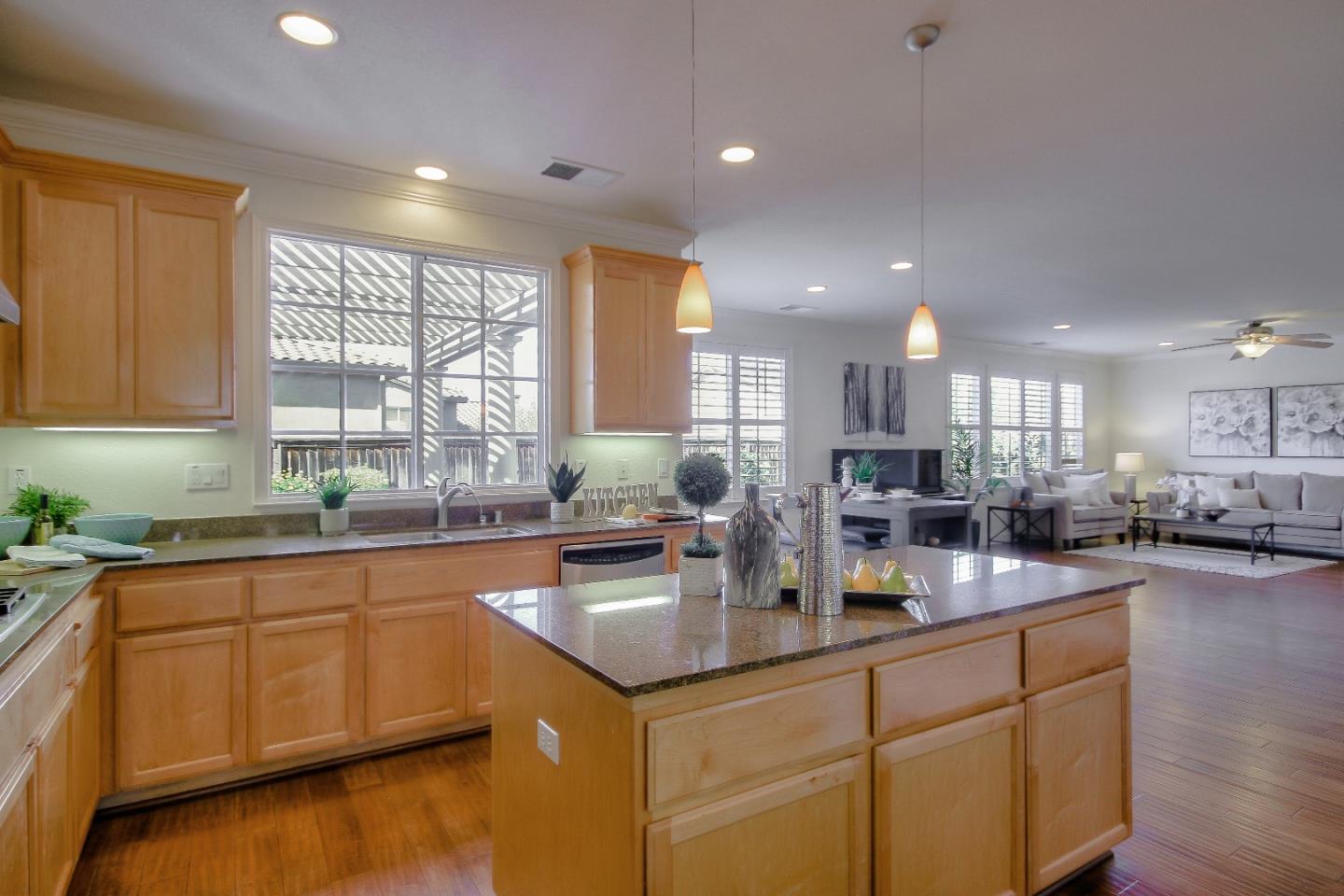 2893 Bethany Road San Ramon, CA 94582 - Photo 13 of 43 a kitchen with lots of counter top space and living room