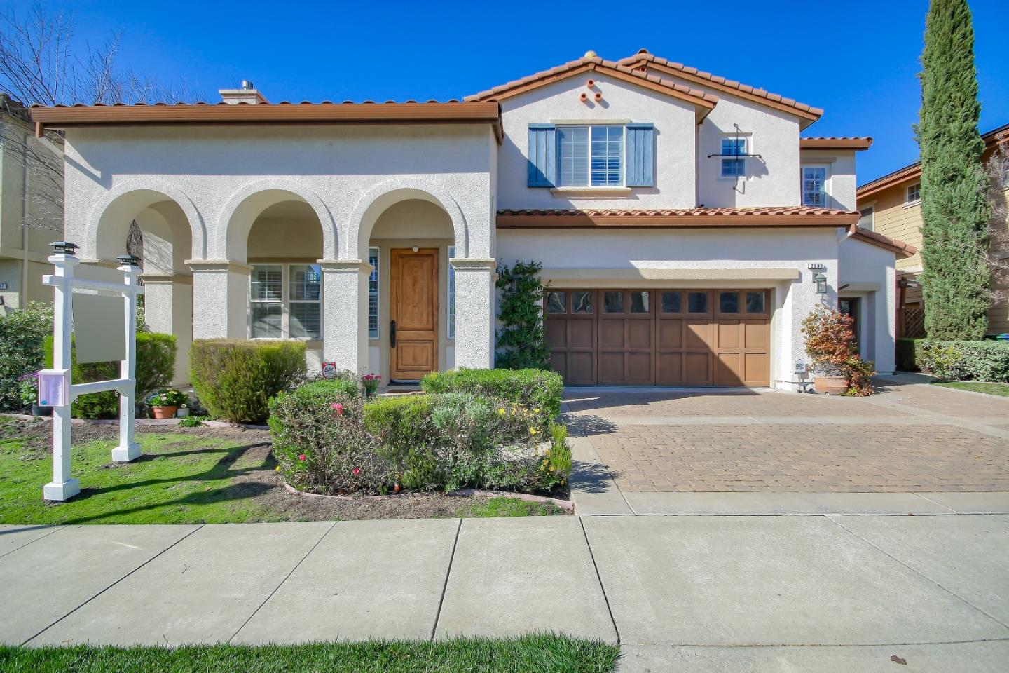 2893 Bethany Road San Ramon, CA 94582 - Photo 2 of 43 a view of a white house with large windows and a small yard