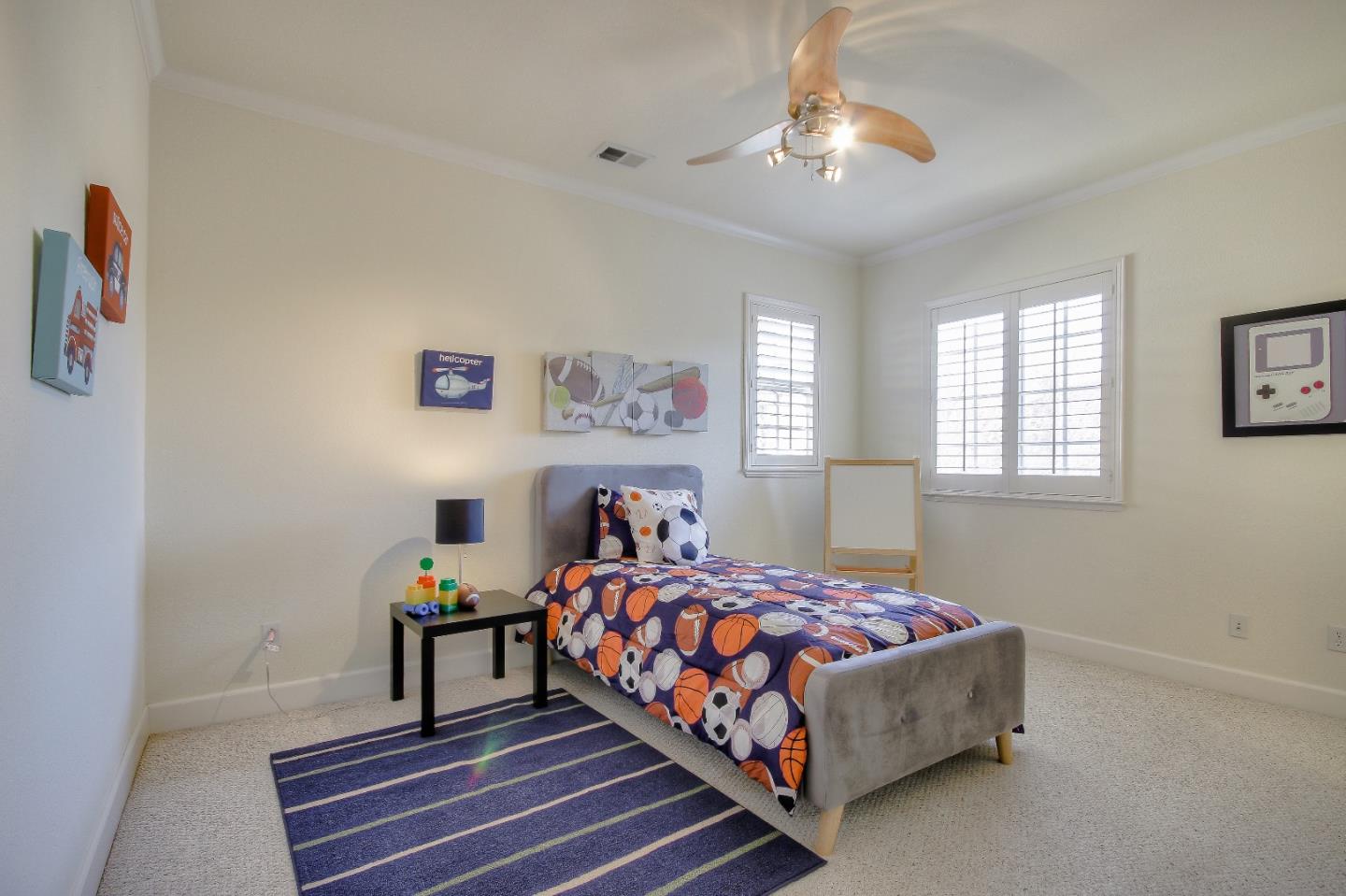 2893 Bethany Road San Ramon, CA 94582 - Photo 25 of 43 a bedroom with a bed and a chandelier