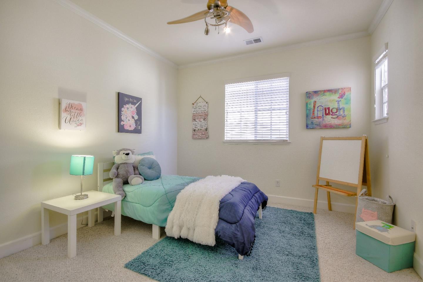 2893 Bethany Road San Ramon, CA 94582 - Photo 27 of 43 a bed room with a bed and a chair