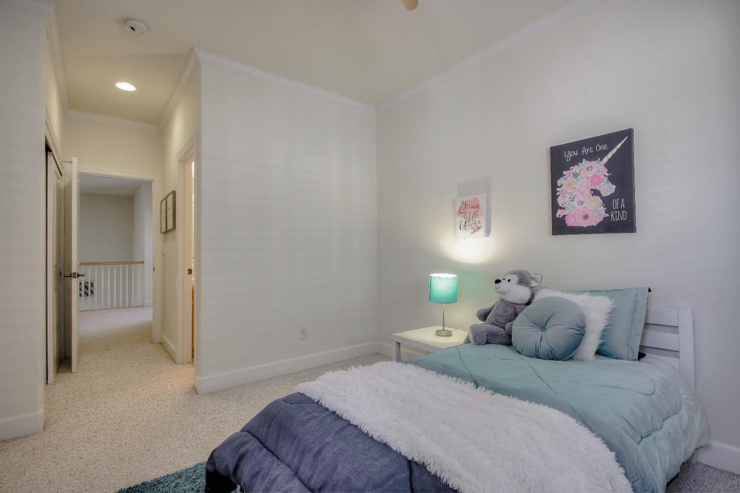 2893 Bethany Road San Ramon, CA 94582 - Photo 28 of 43 a bedroom with a bed and a painting on the wall