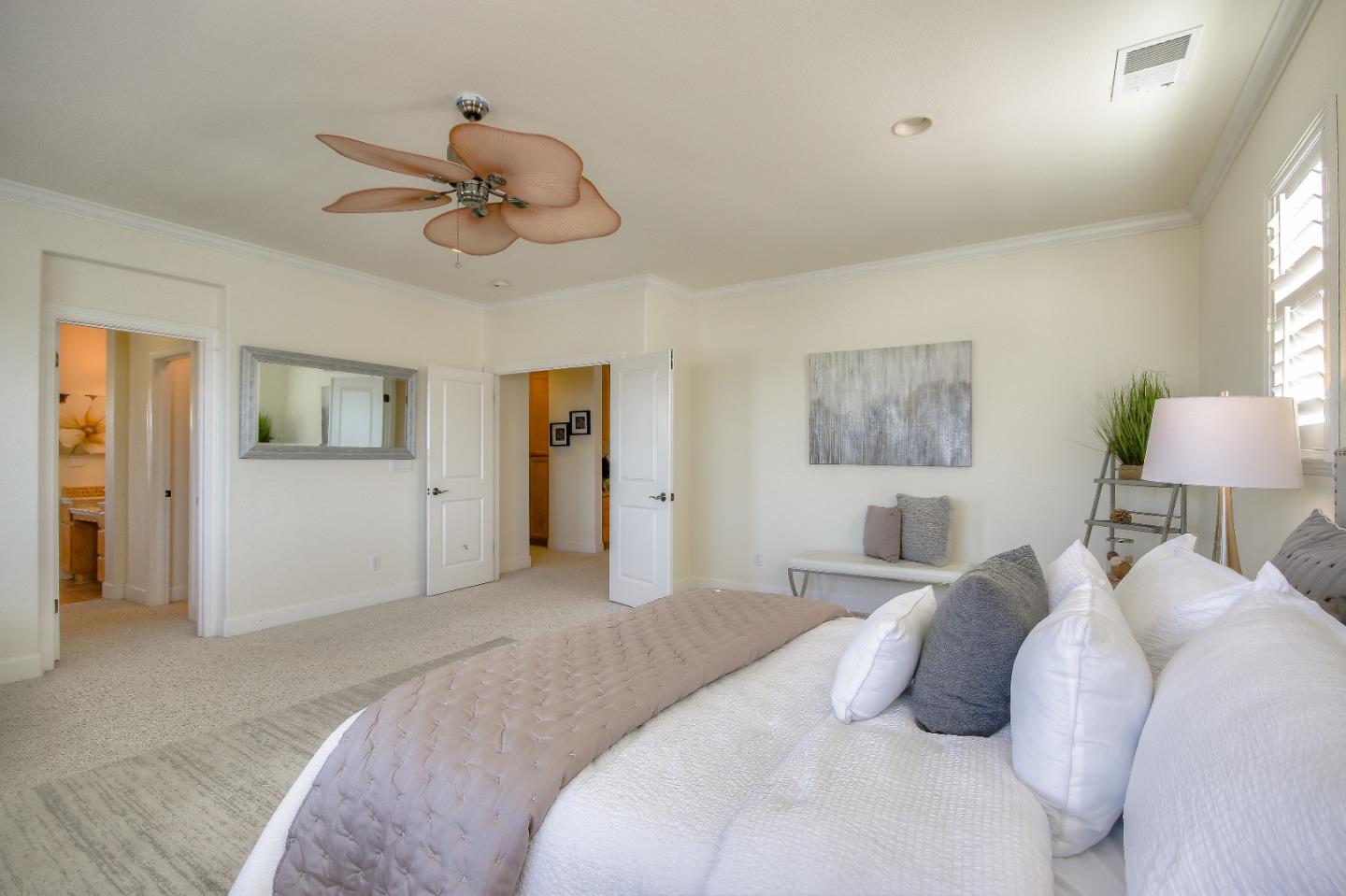 2893 Bethany Road San Ramon, CA 94582 - Photo 29 of 43 a bedroom with a bed and a chandelier