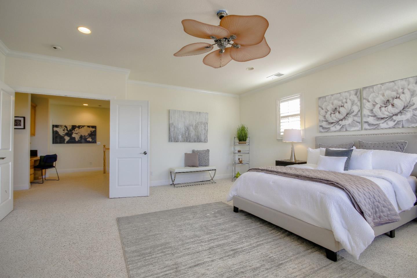 2893 Bethany Road San Ramon, CA 94582 - Photo 30 of 43 a spacious bedroom with a bed and a chandelier