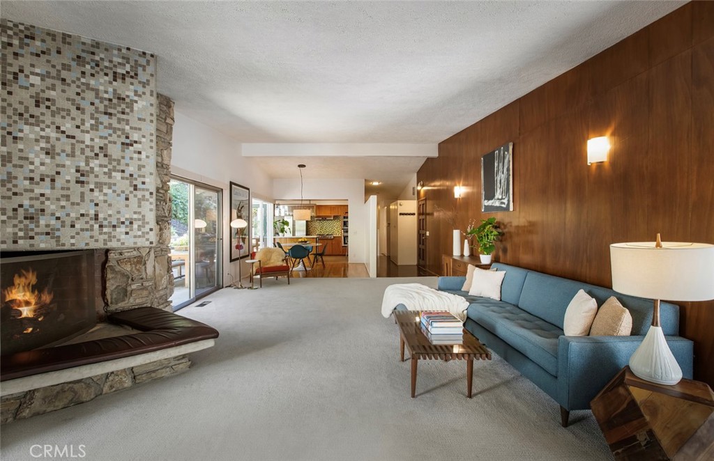 2820 East Chevy Chase Drive Glendale, CA 91206 - Photo 17 of 55 a living room with furniture and a fireplace