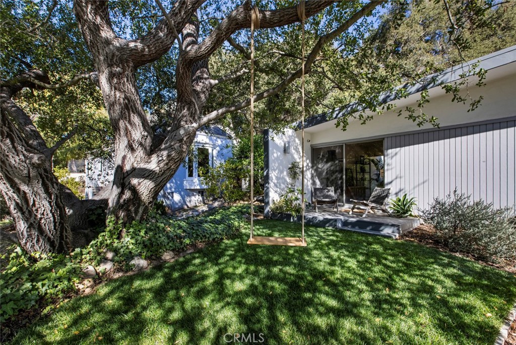 2820 East Chevy Chase Drive Glendale, CA 91206 - Photo 19 of 55 a view of a house with a small yard and tree s