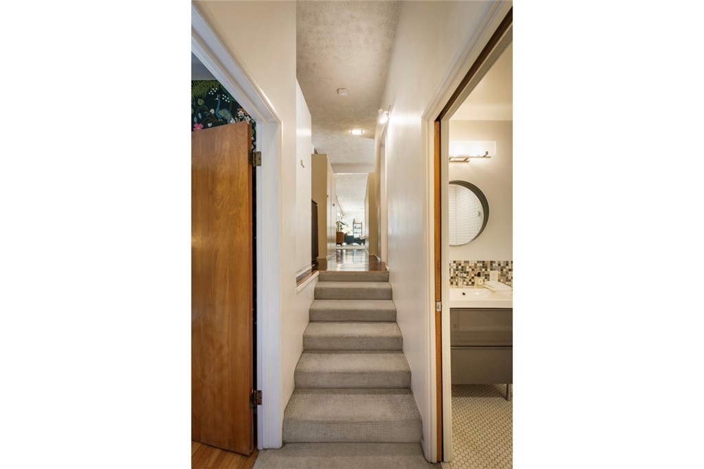 2820 East Chevy Chase Drive Glendale, CA 91206 - Photo 29 of 55 a view of a hallway with wooden floor