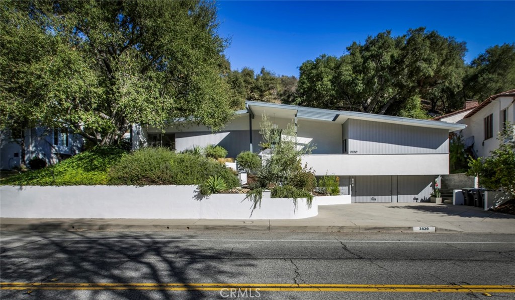 2820 East Chevy Chase Drive Glendale, CA 91206 - Photo 3 of 55 front view of a house with a street