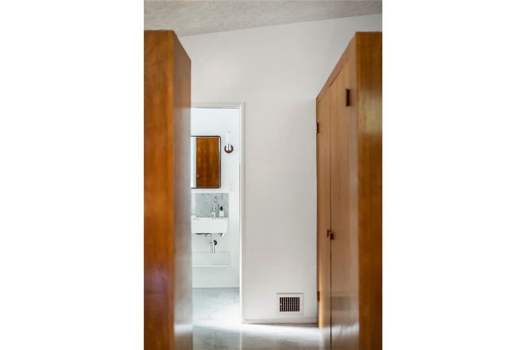 2820 East Chevy Chase Drive Glendale, CA 91206 - Photo 33 of 55 a bathroom with a shower and a mirror