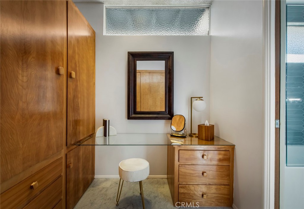 2820 East Chevy Chase Drive Glendale, CA 91206 - Photo 35 of 55 a bathroom with a sink and a mirror