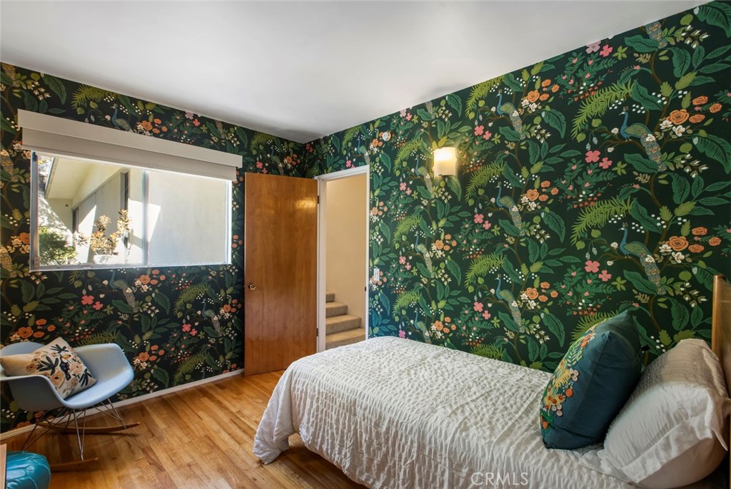 2820 East Chevy Chase Drive Glendale, CA 91206 - Photo 39 of 55 a bedroom with a bed and a window