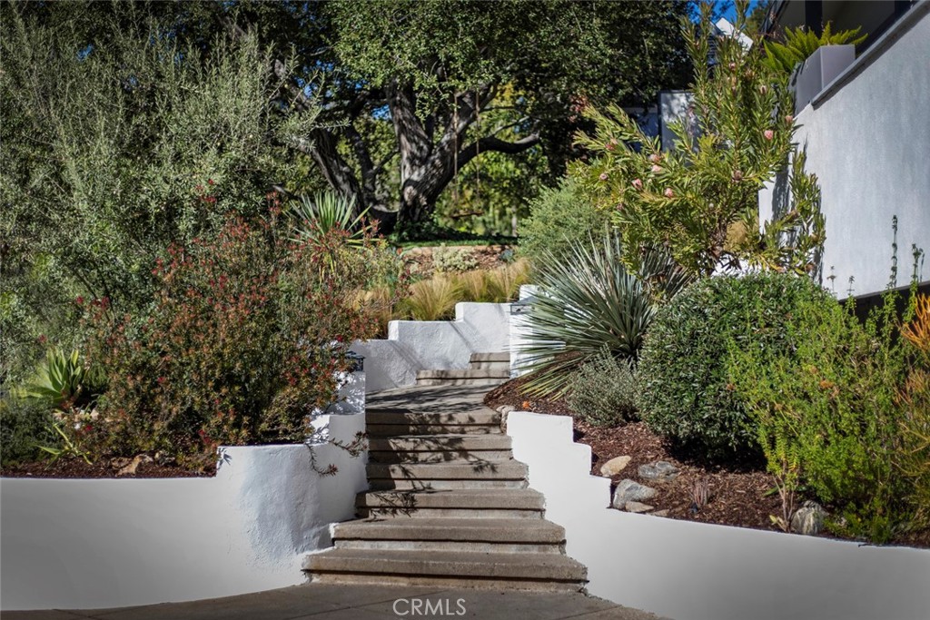 2820 East Chevy Chase Drive Glendale, CA 91206 - Photo 6 of 55 a view of a fountain in the middle of a yard