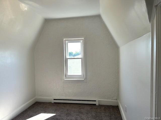 578 South 15th Street, Unit 2 Lindenhurst, NY 11757 - Photo 6 of 8 an empty room with a window